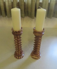 Twist candle holders won a turning of the month for Ted Hogben